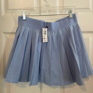 GARAGE baby blue pleated skirt, size M.